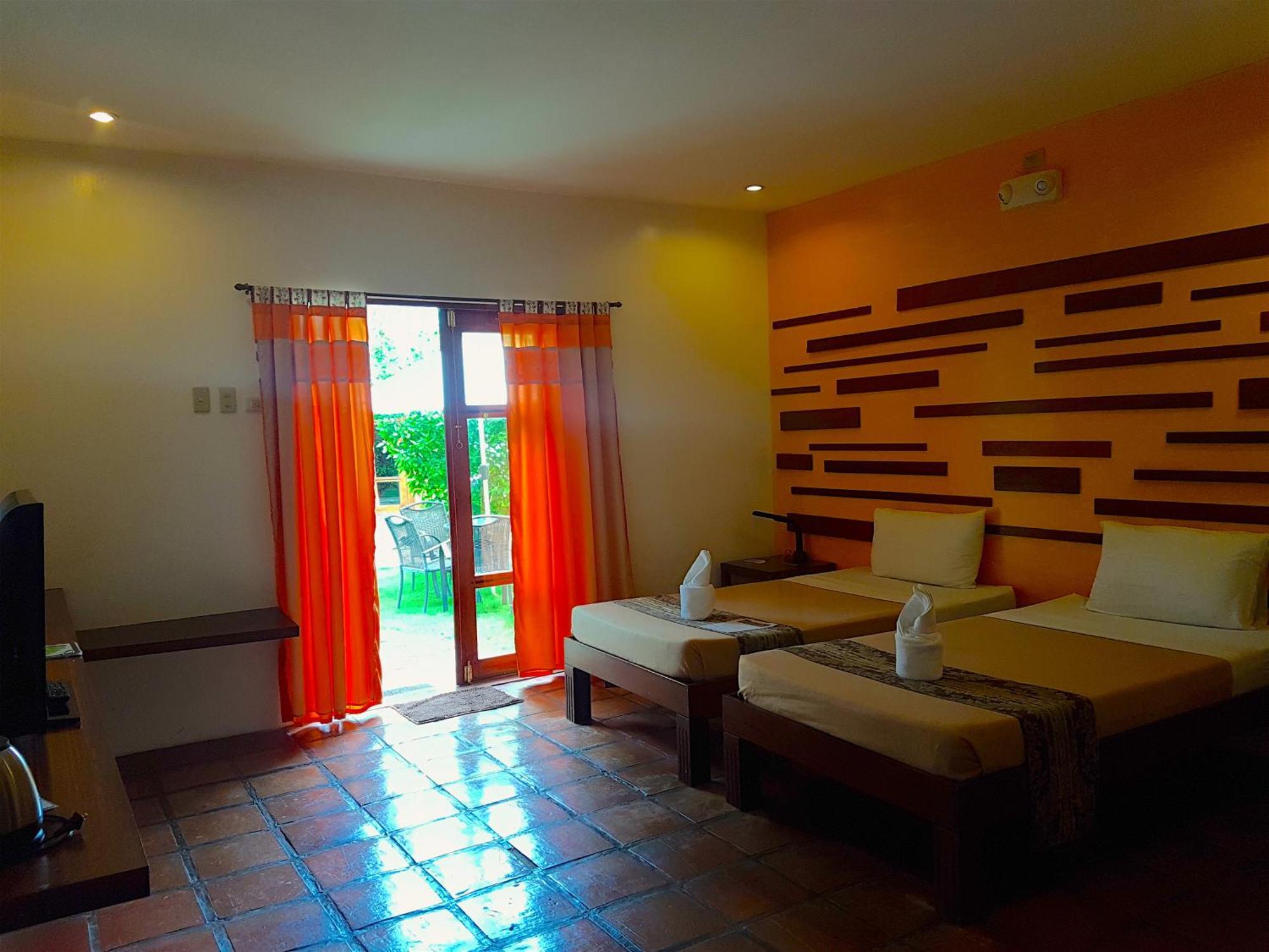 Acacia Tree Garden Hotel Puerto Princesa Bagian luar foto